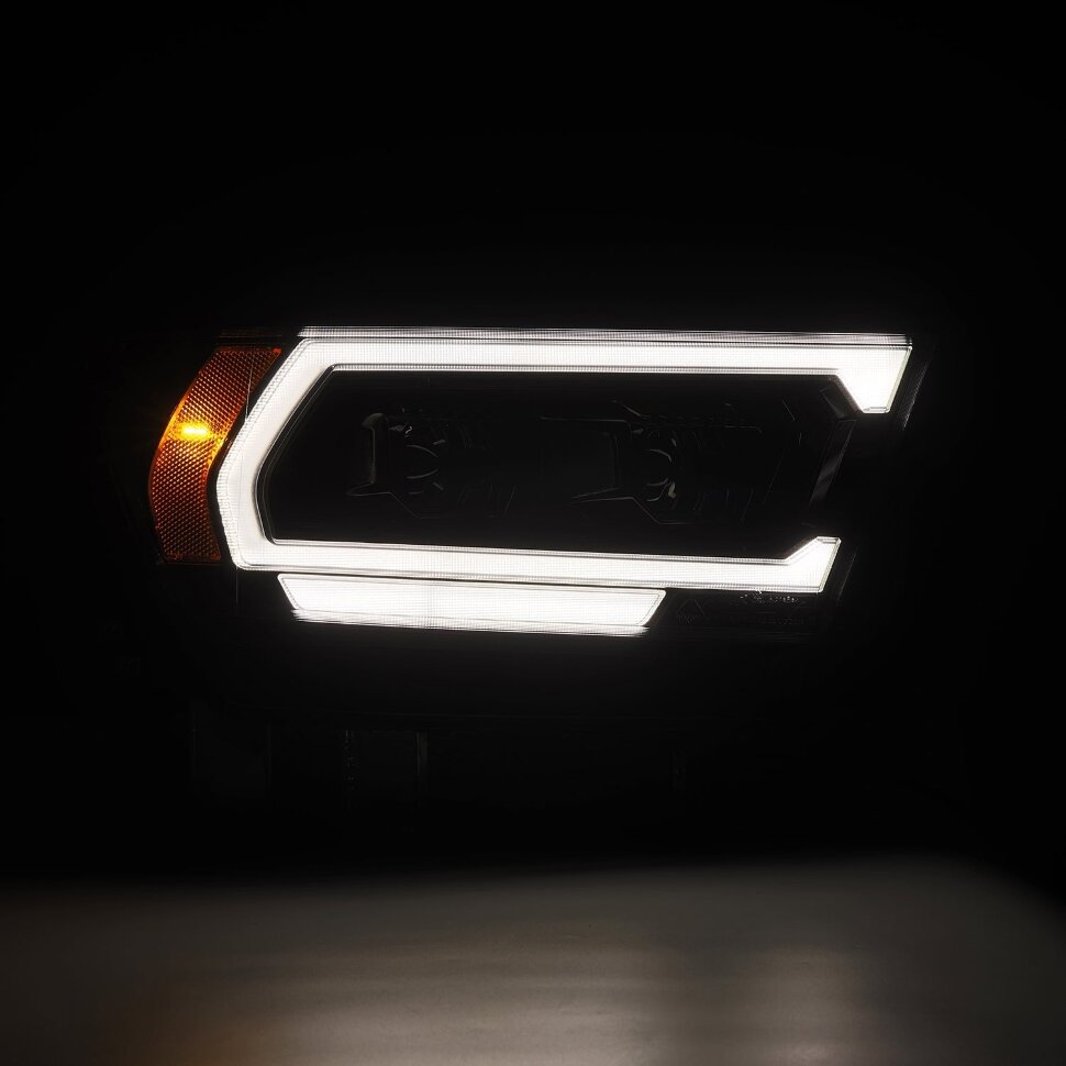 Комплект передніх галогенних фар Dodge Ram 1500 19-24 PRO-Series AlphaRex 880573