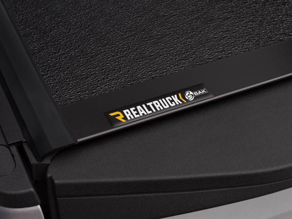 Крышка багажника складная Dodge Ram 1500 09-24 5'7" F1 BAK 772207